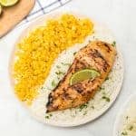 Grilled honey lime chicken breast is bright, sweet, and smoky, and is just as delicious on its own as a main dish as it is on top of salads, tacos, or anything else!