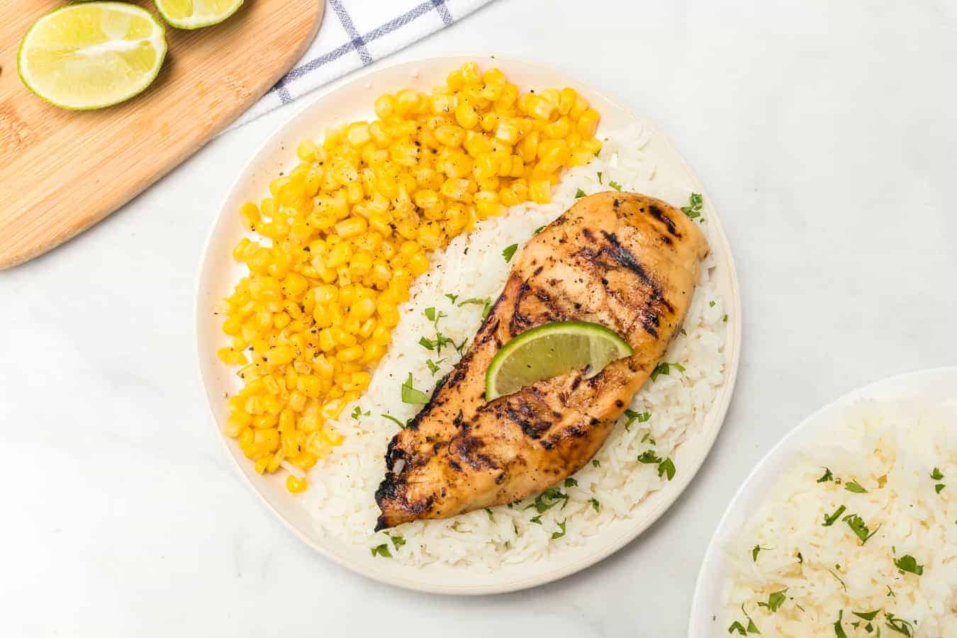 Grilled honey lime chicken breast is bright, sweet, and smoky, and is just as delicious on its own as a main dish as it is on top of salads, tacos, or anything else!