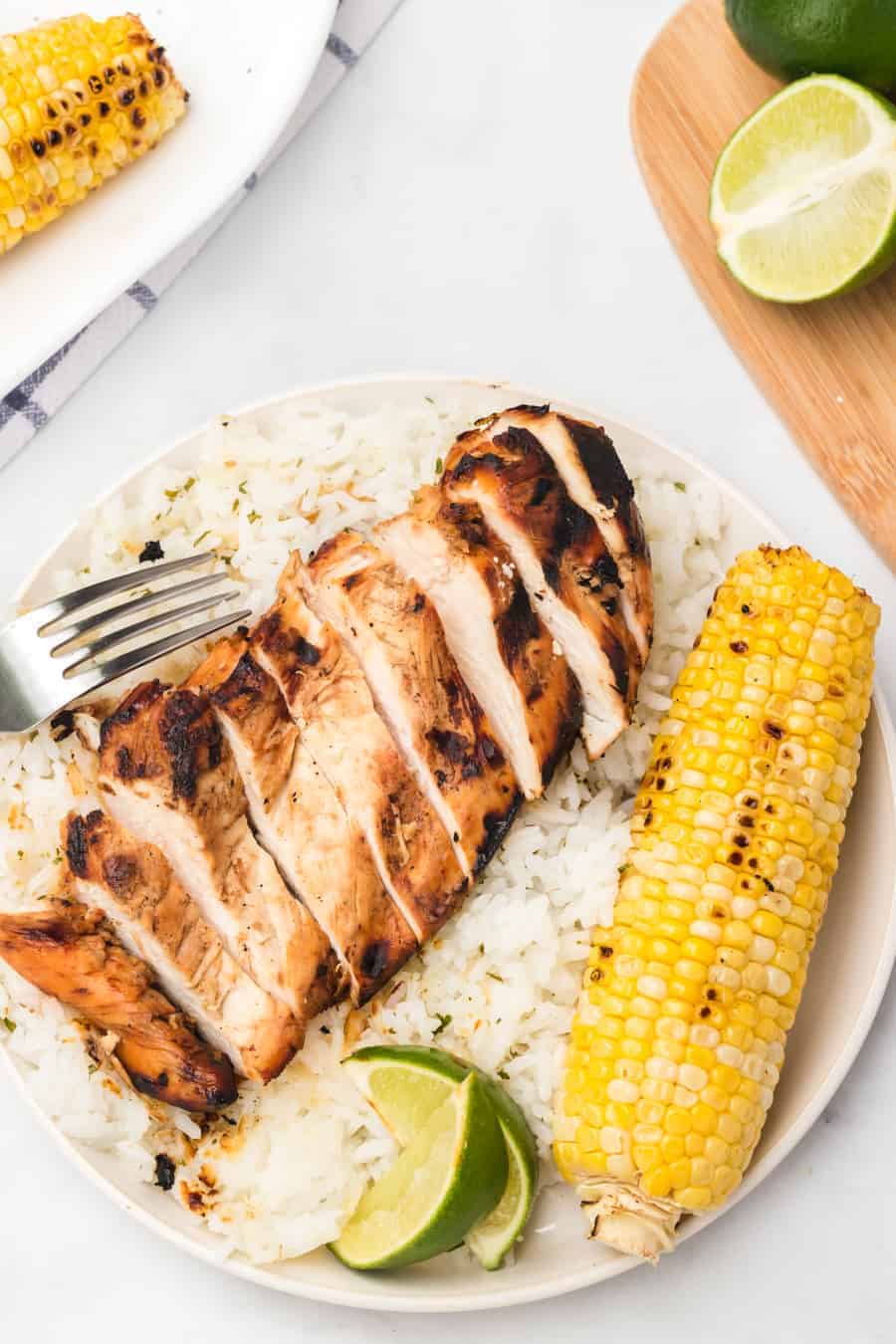 Grilled honey lime chicken breast is bright, sweet, and smoky, and is just as delicious on its own as a main dish as it is on top of salads, tacos, or anything else!