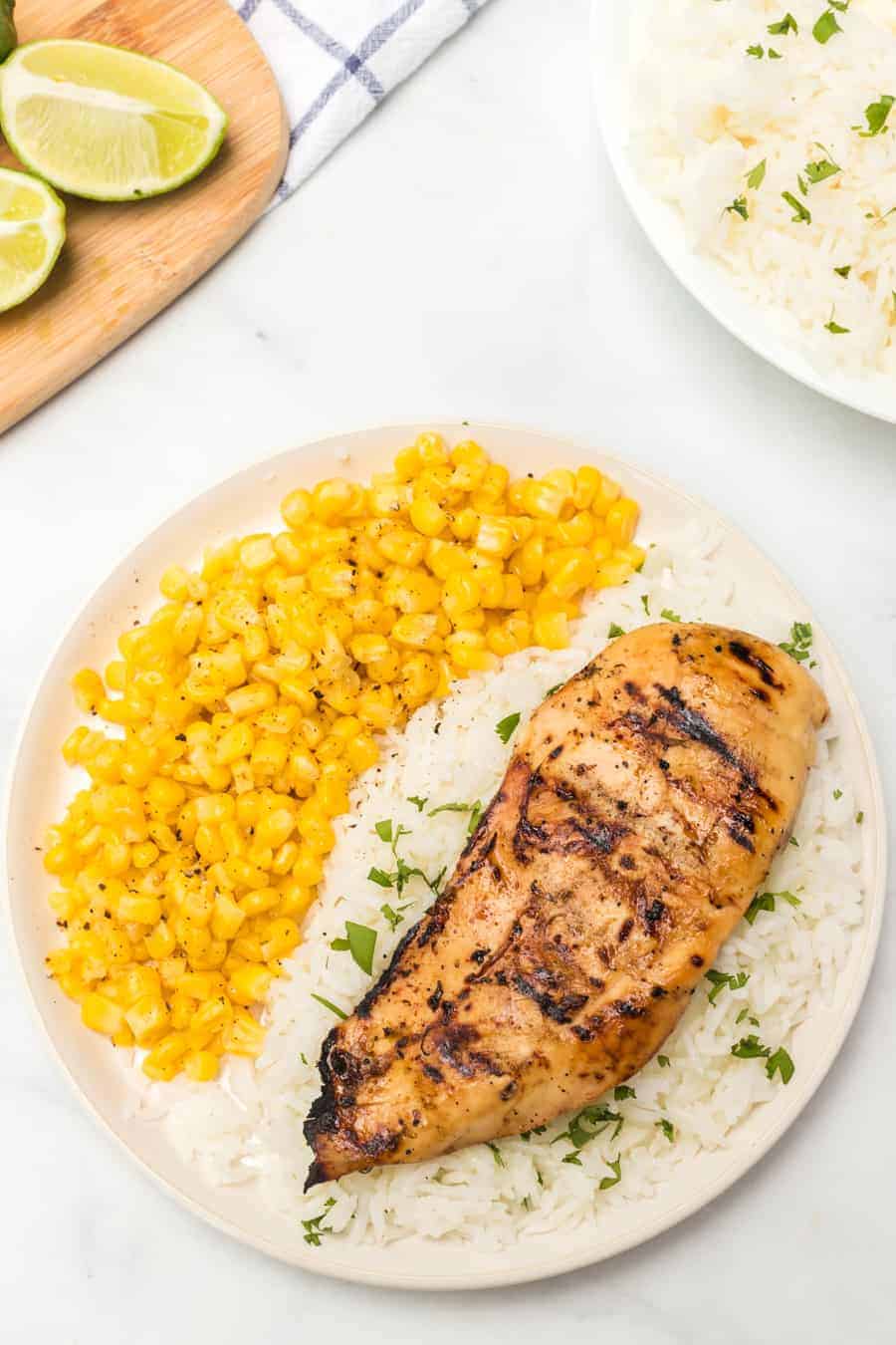 Grilled honey lime chicken breast is bright, sweet, and smoky, and is just as delicious on its own as a main dish as it is on top of salads, tacos, or anything else!