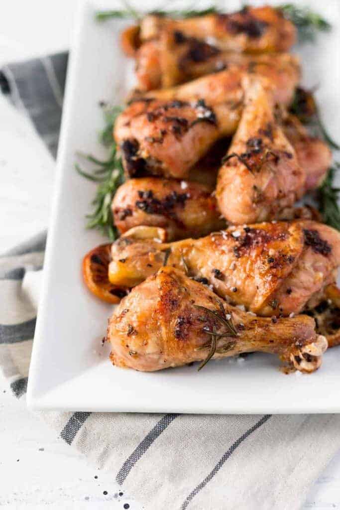 Simple Oven Roasted Chicken Drumsticks made with butter, garlic, herbs, and more. This simple dish will be on the table in 40 minutes or less!