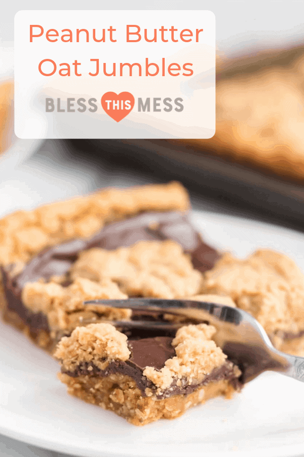 Perfectly equal parts chewy, crusty, and soft, these Peanut Butter Oat Jumbles bars are one of the best chocolate-peanut butter cookie desserts around.