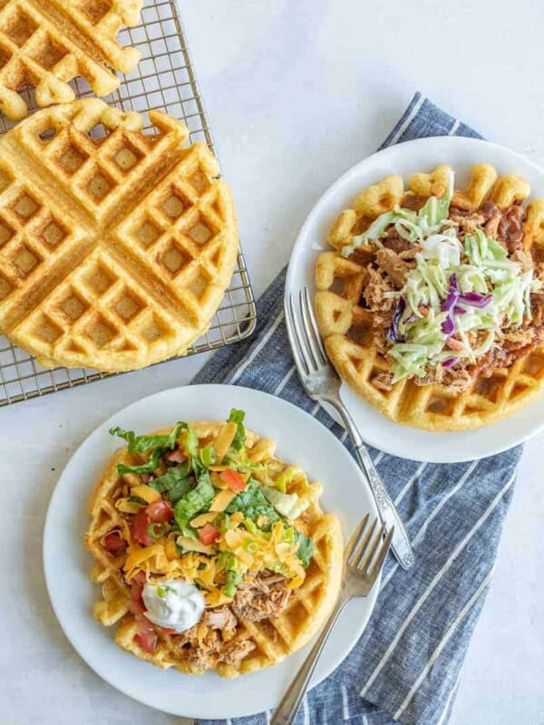 savory cornbread waffles on a white plate overhead view