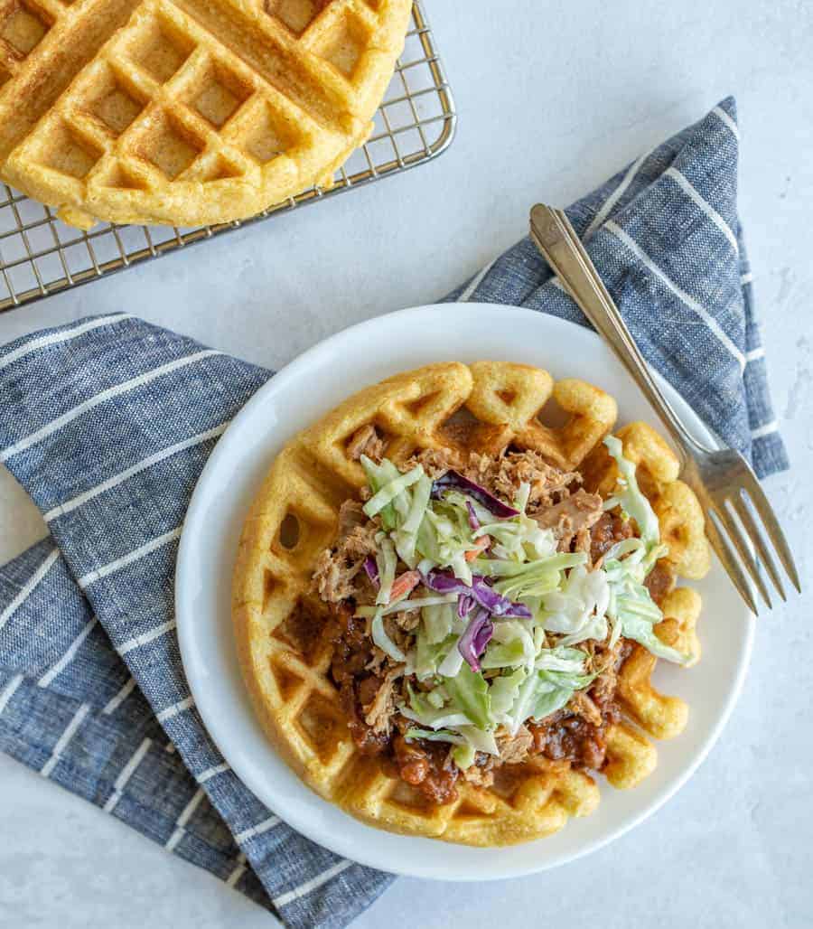 top view cornbread savory waffle with pulled pork on top