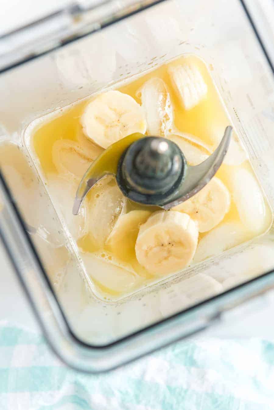 You can't go wrong with the refreshing and tropical flavors of this orange pineapple banana smoothie! #smoothie #fruitsmoothie #tropicalsmoothie #orange #pineapple #banana