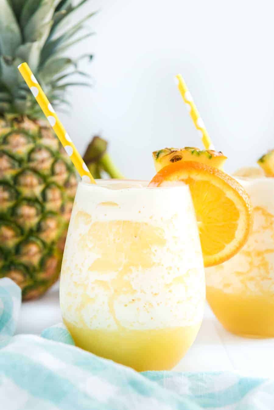 You can't go wrong with the refreshing and tropical flavors of this orange pineapple banana smoothie! #smoothie #fruitsmoothie #tropicalsmoothie #orange #pineapple #banana