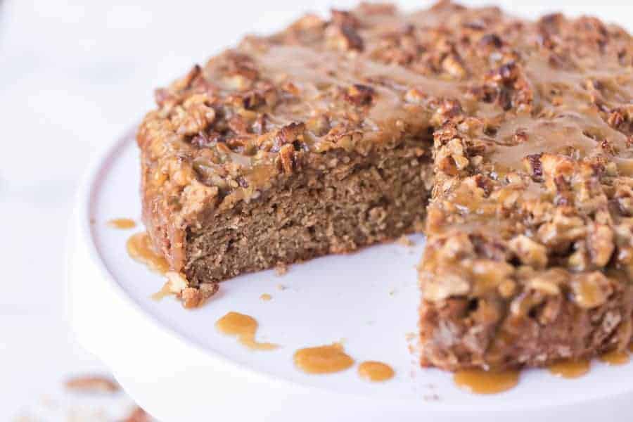 cut old fashioned oatmeal cake on white cake stand