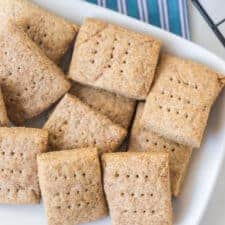 simple graham crackers on white dish and blue striped towel