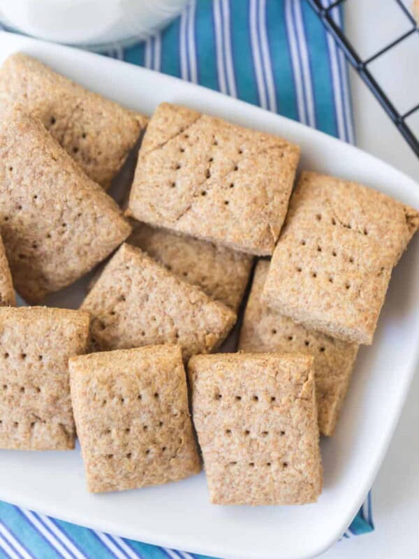 simple graham crackers on white dish and blue striped towel