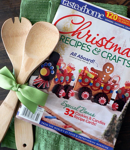 Christmas Recipes and Crafts magazine with two wooden spoons tied with green ribbon