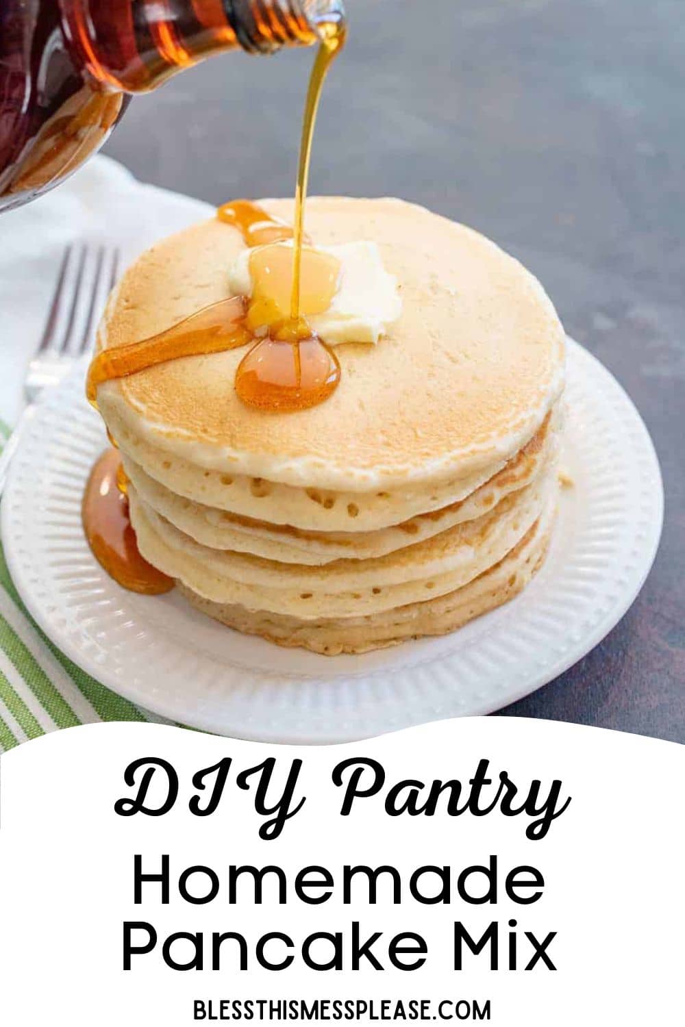A stack of pancakes topped with butter and syrup sits on a white plate. Syrup is being poured from a bottle. A fork and striped napkin are beside the plate. Text reads: Made with homemade pancake mix.