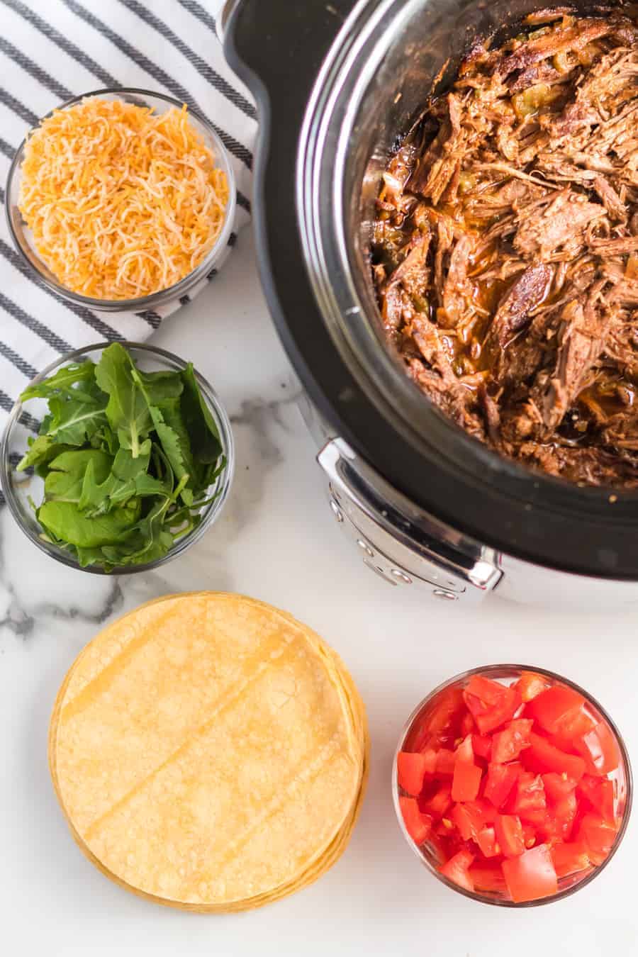 Smoky and hearty Steak Carnitas Meat in the Crock-Pot is one of the best set-it-and-forget-it meals that's exquisitely flavored and makes some tender and rich tacos.