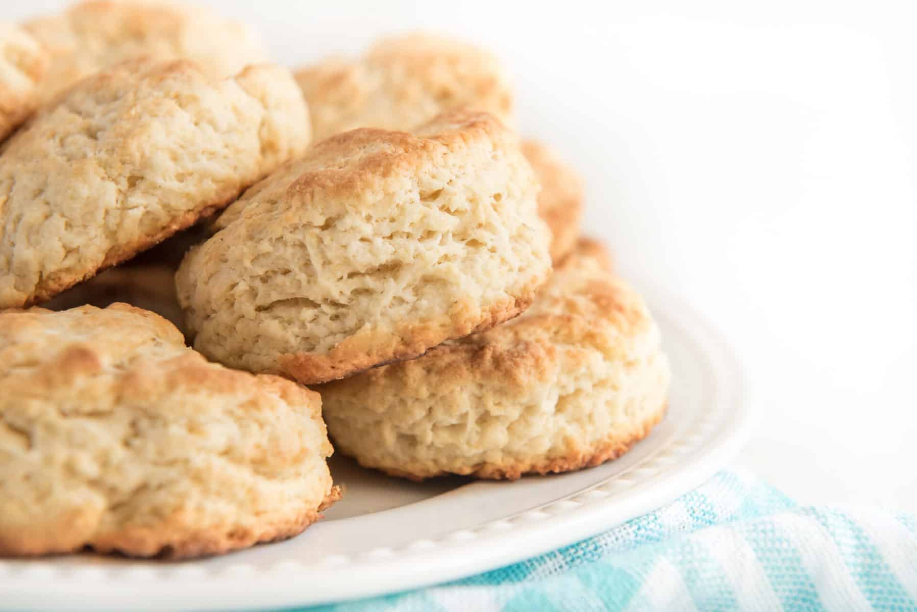 The best butter biscuit recipe EVER, perfect for lazy mornings lounging around the house when all you want is a cozy, comforting breakfast! This is a no-fuss recipe with simple instructions that anyone can make with ease, and they come out fluffy and flaky every time. #biscuits #butterbiscuits #biscuitrecipe #biscuit #homemadebiscuits