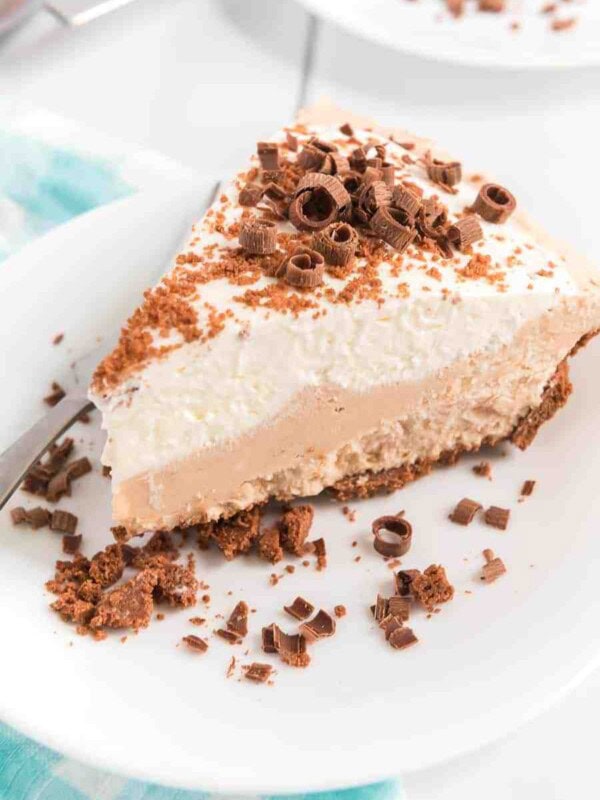 Creamy and chock-full of peanut butter, this No Bake Peanut Butter Pie has a chocolate crust and chocolate shavings on top to finish things off with perfection!