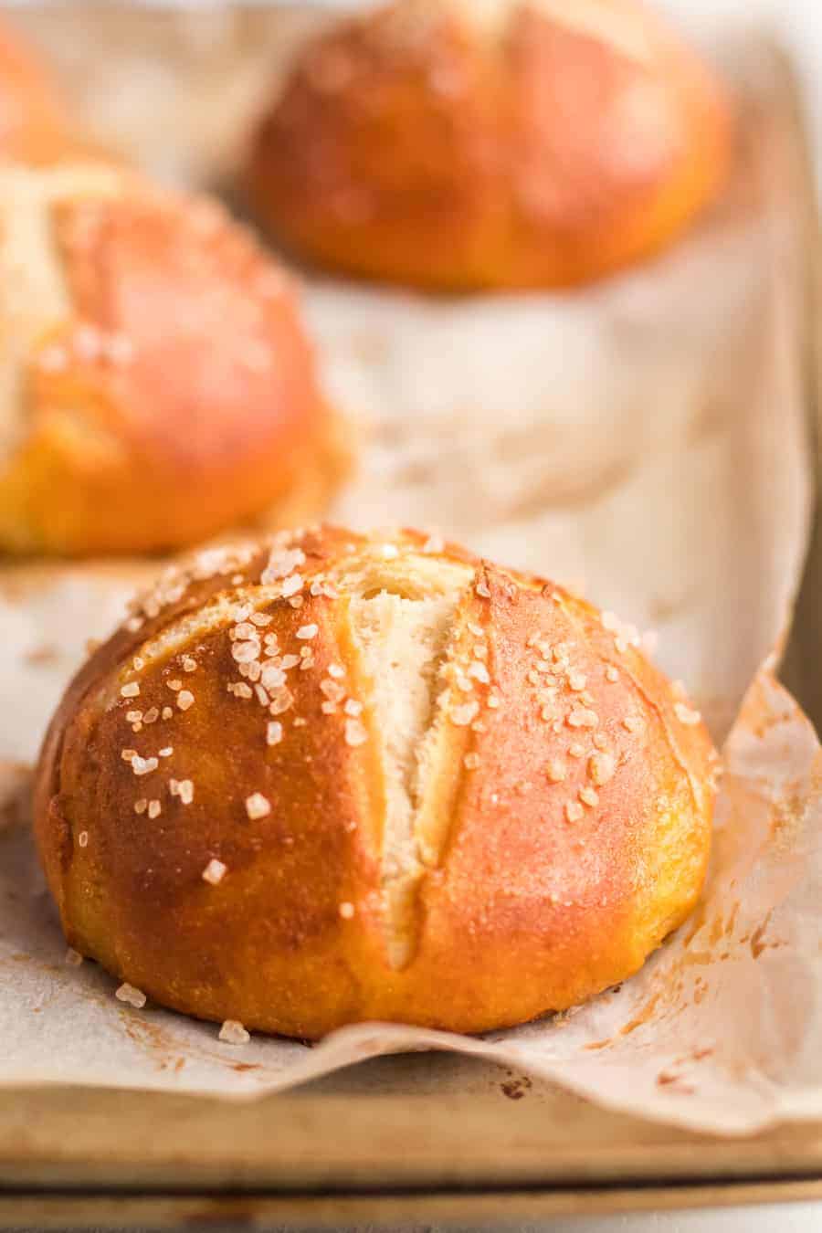 Homemade Pretzel Rolls made with a simple yeast dough that is kneaded until soft, boiled, and then baked into soft and extra chewy pretzel rolls.
