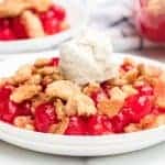 Sweet and tart with the perfect buttery, crumbly topping, homemade cherry crumble is an absolute game changer when it comes to festive and fun summertime dessert.