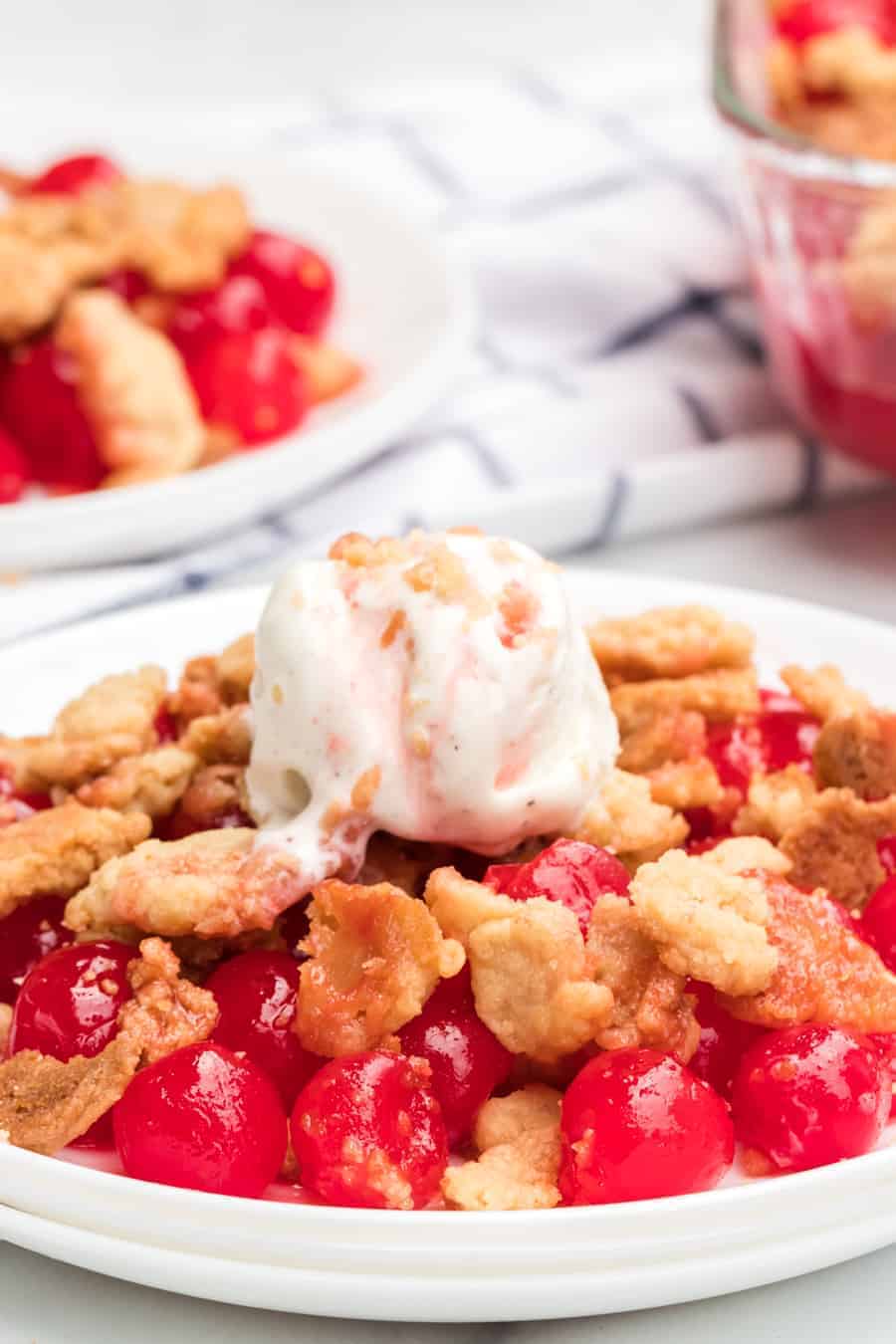 Sweet and tart with the perfect buttery, crumbly topping, homemade cherry crumble is an absolute game changer when it comes to festive and fun summertime dessert.