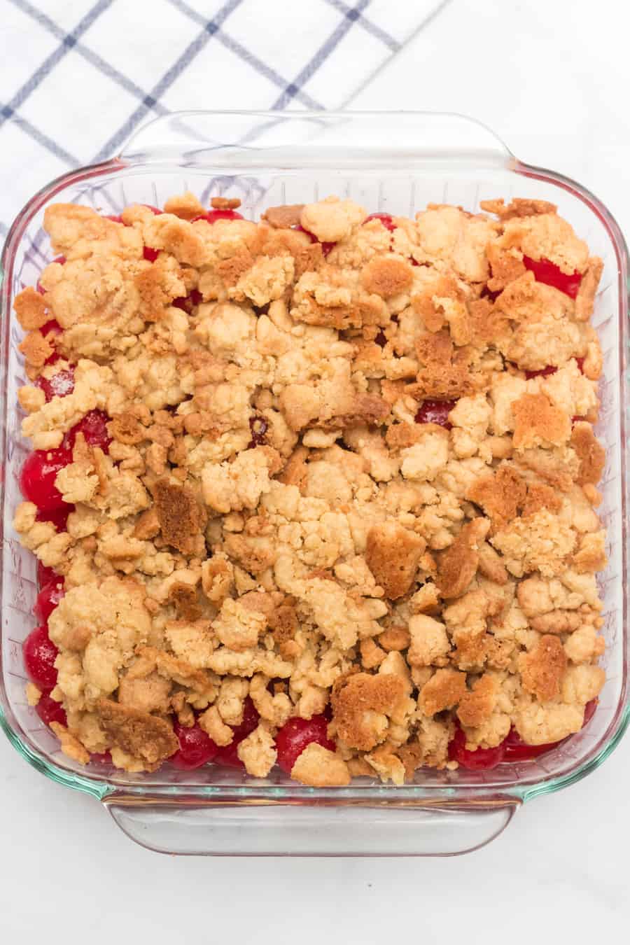 Sweet and tart with the perfect buttery, crumbly topping, homemade cherry crumble is an absolute game changer when it comes to festive and fun summertime dessert.