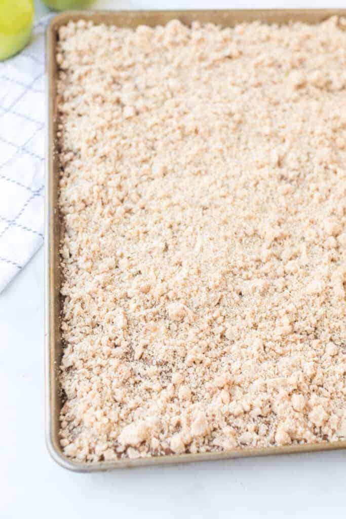 baking dish with raw apple crumble