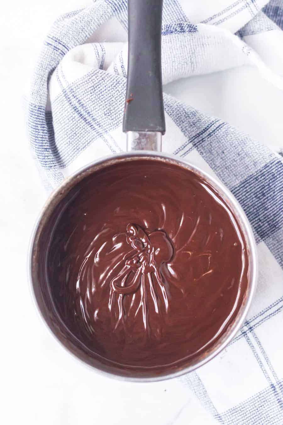 The dessert you've been missing in your life, this chocolate and salted caramel tart is everything you could want and more in a sweet treat -- including simple, step-by-step instructions to make it with ease! #tart #chocolatetart #dessert