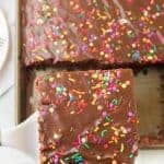top view of chocolate sheet cake with sprinkles on top