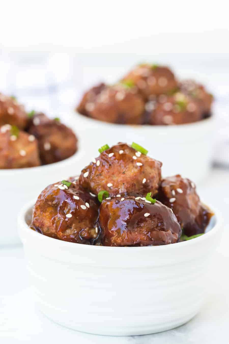 Homemade slow cooker teriyaki honey meatballs are a sweet, savory, and satisfying appetizer that comes together so easily for a scrumptious snack everyone will love. #meatballs #teriyaki #slowcookermeatballs