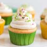 vanilla cupcakes with buttercream icing on top
