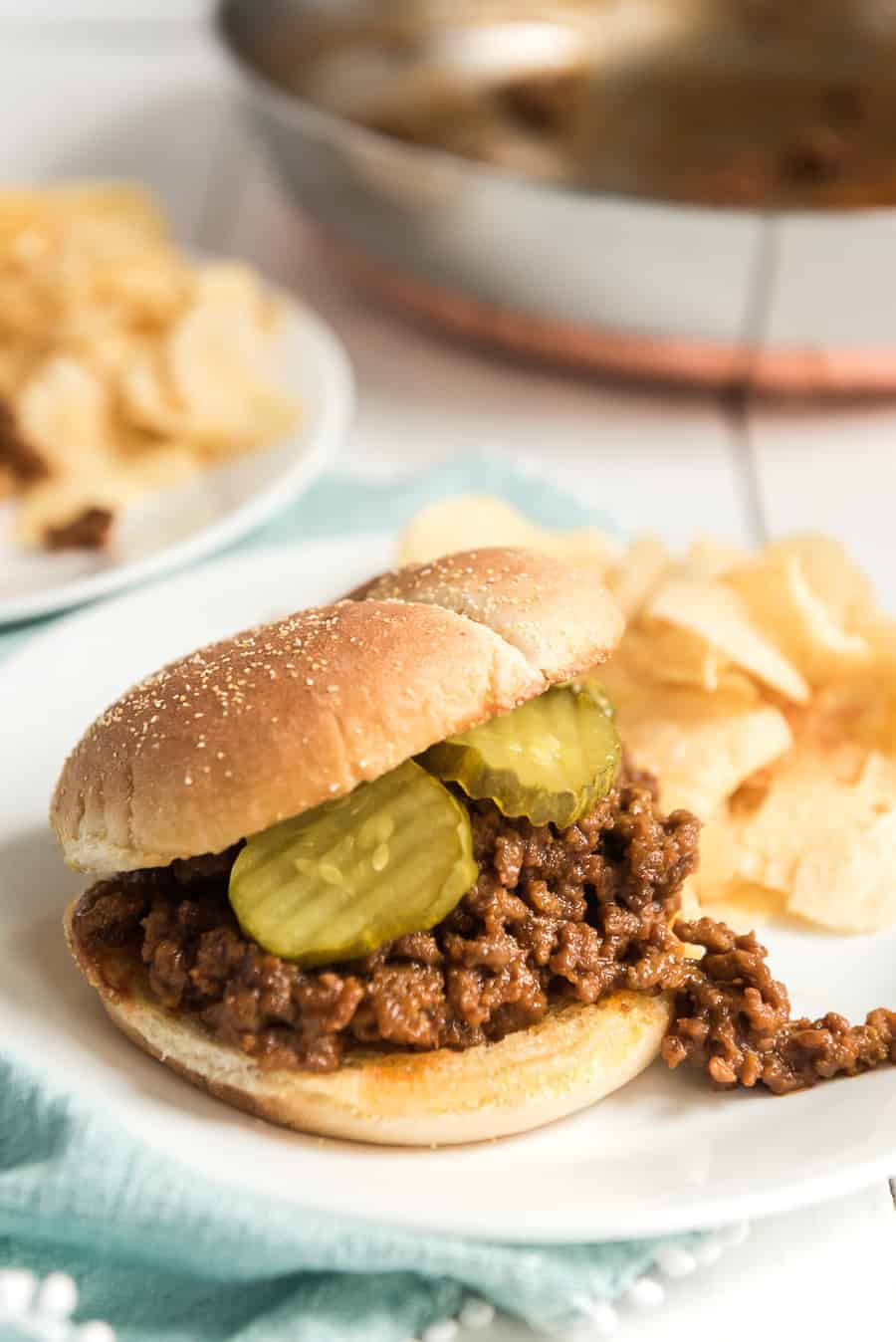 These homemade sloppy Joes are quick, easy, and delicious. No canned food of any kind is needed for this recipe! Just ketchup, brown sugar, lots of flavor, and your favorite kitchen helpers. Sloppy Joes are such a fun treat and the absolutely easiest meal to make -- plus, kids love 'em and adults love 'em, so it's a total win all the way around! #sloppyjoes #sloppyjoe #sloppyjoerecipe #sandwich #easysandwich #groundbeef