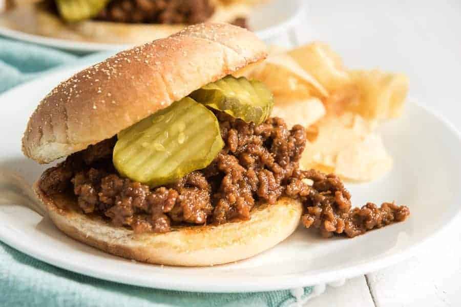 These homemade sloppy Joes are quick, easy, and delicious. No canned food of any kind is needed for this recipe! Just ketchup, brown sugar, lots of flavor, and your favorite kitchen helpers. Sloppy Joes are such a fun treat and the absolutely easiest meal to make -- plus, kids love 'em and adults love 'em, so it's a total win all the way around! #sloppyjoes #sloppyjoe #sloppyjoerecipe #sandwich #easysandwich #groundbeef