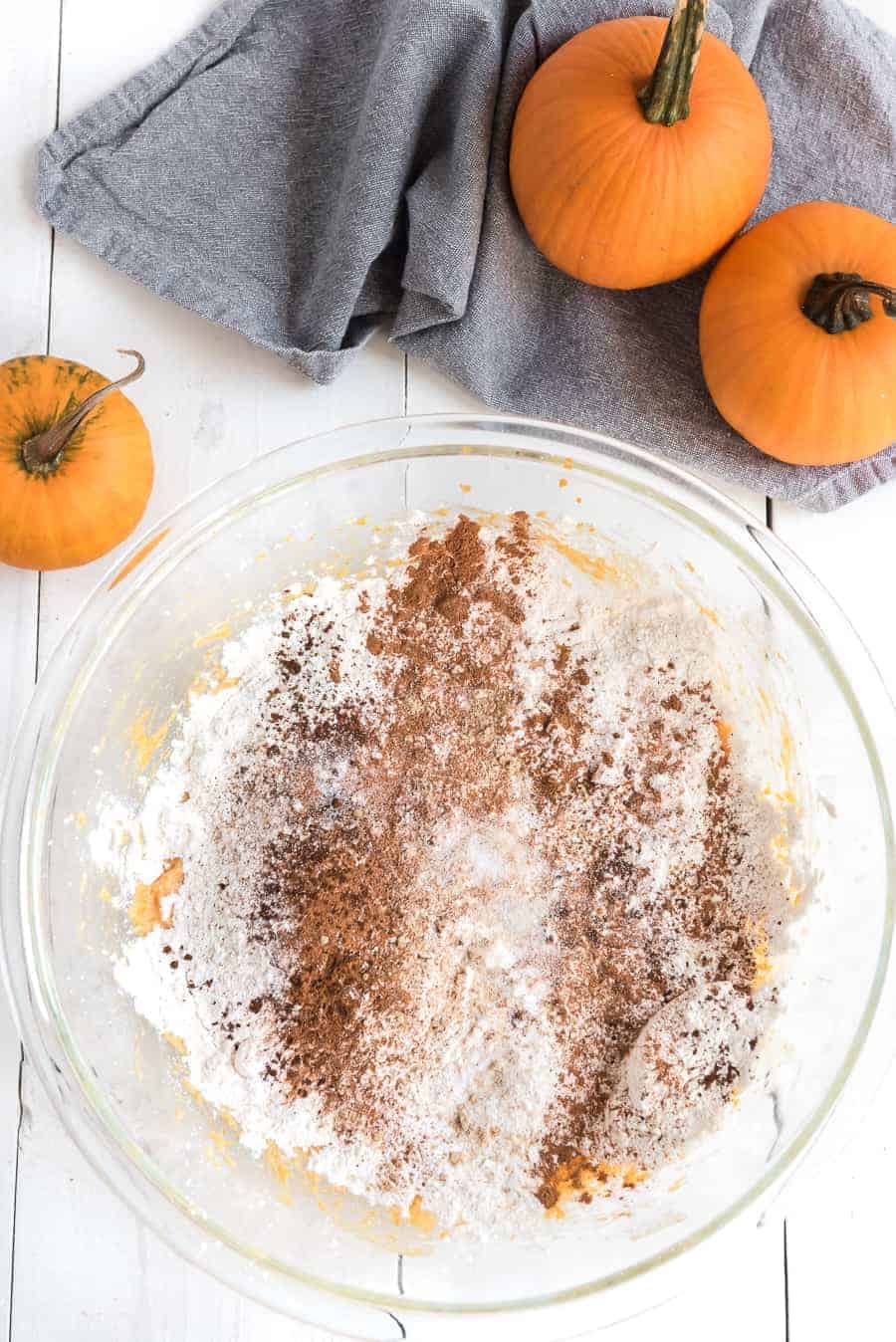 Pumpkin cupcakes with whipped cinnamon icing are perfect bites of fall-inspired sweetness, with just the right amount of pumpkin flavor and warm spices to round them out! #pumpkincupcakes #cupcakerecipe #fallrecipes #pumpkinrecipes #cinnamonfrosting #cupcakes 