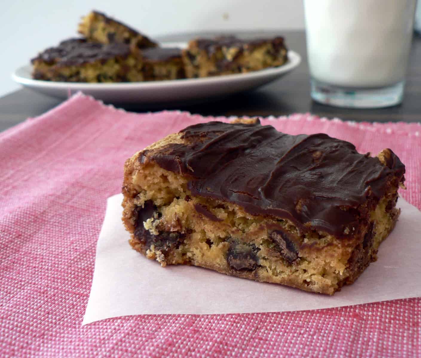 cheater cookie bar with chocolate on top.