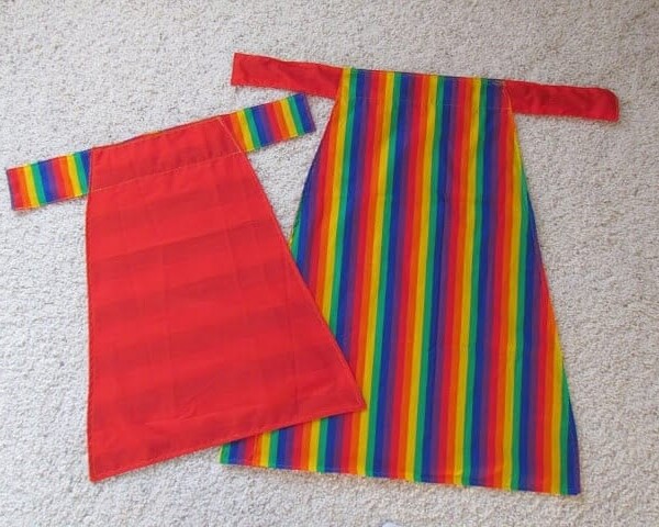 reversible apron - or cape if you're a mom - rainbow on one side and red on the other