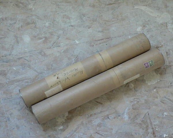 rolls of art and mail found in the walls