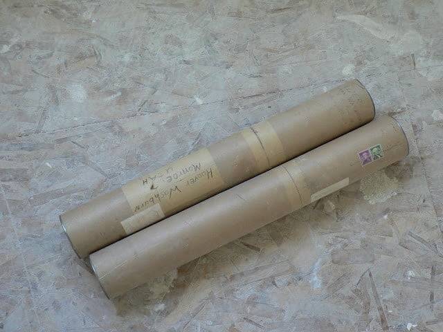 rolls of art and mail found in the walls