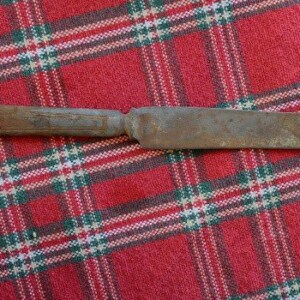 found this old butter knife in the wall of our home reno