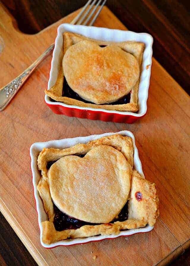Made with black raspberries & a flaky pie crust, this raspberry cobbler recipe is a favorite family dessert passed down by my Grandmother.