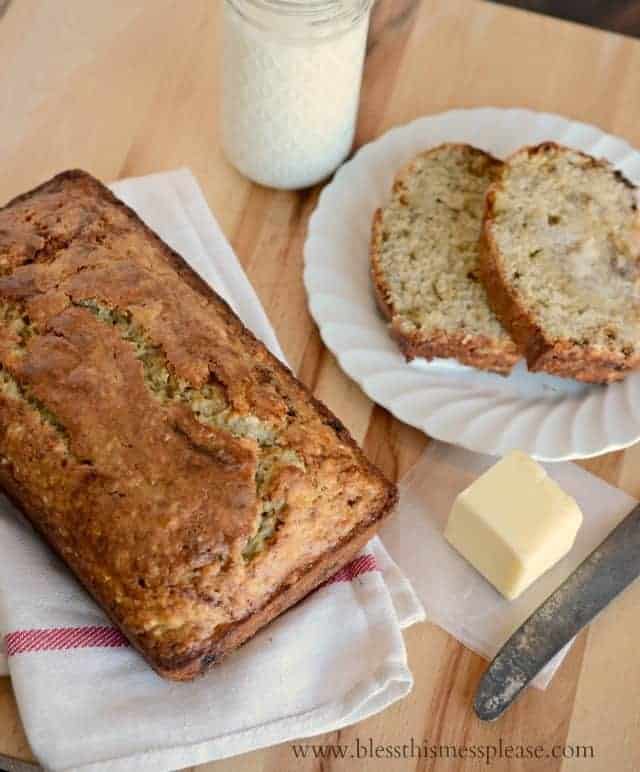 banana bread in a loaf and slices on a plate