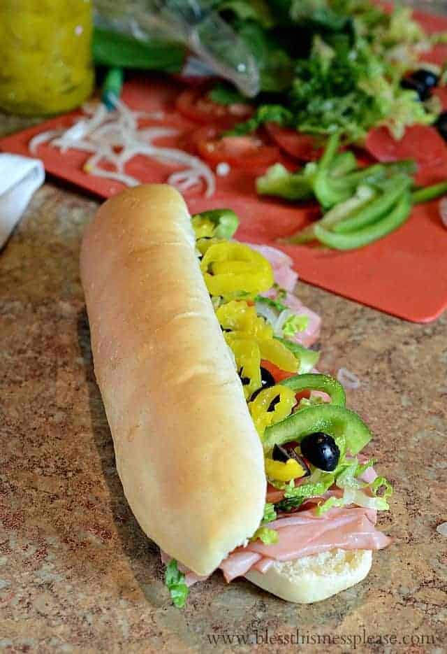 open faced sandwich on table.