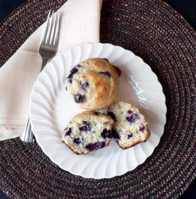 Blueberry lemon muffins on a white plate