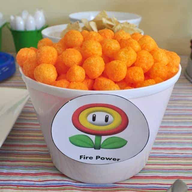 cheese balls in a bowl labeled with a fire flower