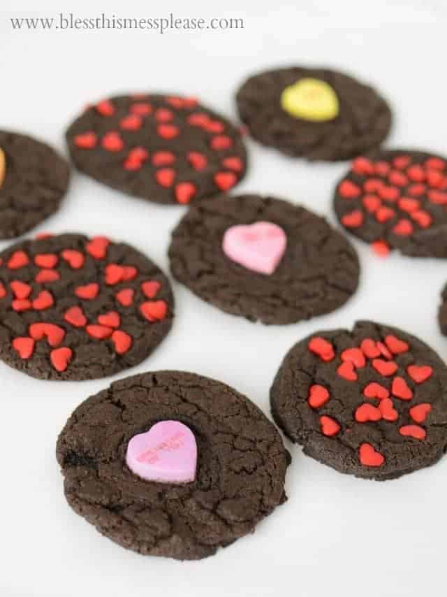 Dark chocolate cookies with heart sprinkles and conversation hearts