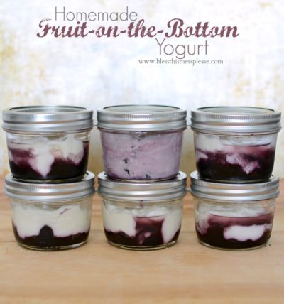 Homemade fruit on the bottom yogurt cups made with blueberries, maple syrup and Greek yogurt.