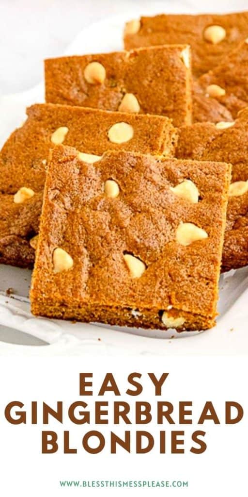 Side view of a few cut pieces of a blondies with white chocolate chips showing on a plate with the words "easy gingerbread blondies" at the bottom