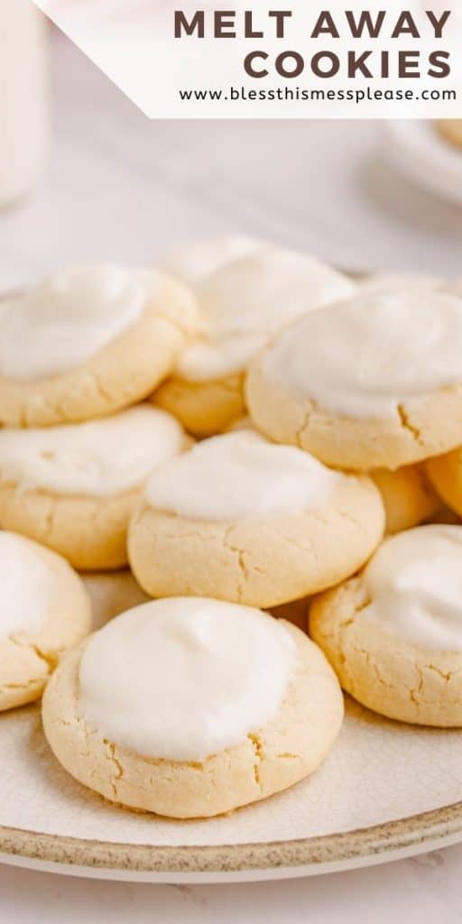 cookies on ceramic plate stacked nicely with words "melt away cookies" at the top