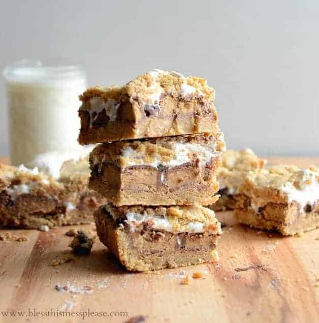 Reese's Stuffed Peanut Butter S'more Bars includes a peanut buttery graham cracker infused cookie-like crust, Reese's cups, chocolate, and marshmallow all melted together into one incredible dessert.