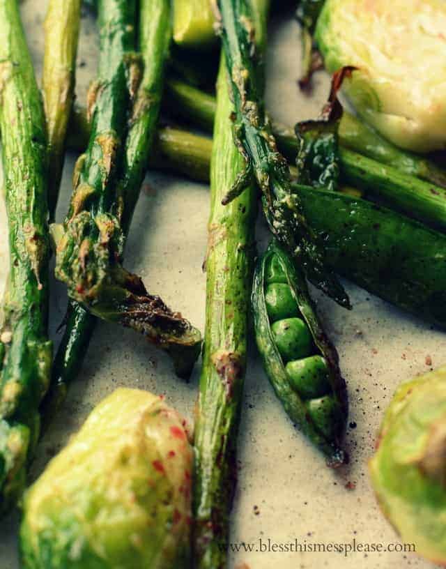 closeup shot of roasted vegetables with a pea split open