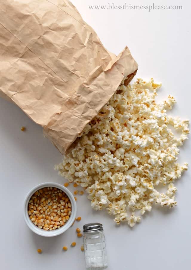 Quick and easy guide on how to pop popcorn in the microwave using just a paper bag, no oil needed. 