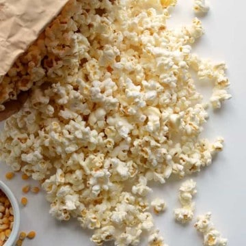 A quick and easy guide on How to Pop Popcorn in the Microwave Using Just a Paper Bag, no oil needed. Making popcorn has never been easier!