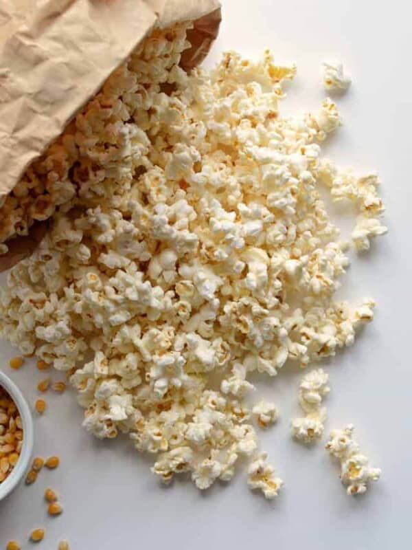 A quick and easy guide on How to Pop Popcorn in the Microwave Using Just a Paper Bag, no oil needed. Making popcorn has never been easier!