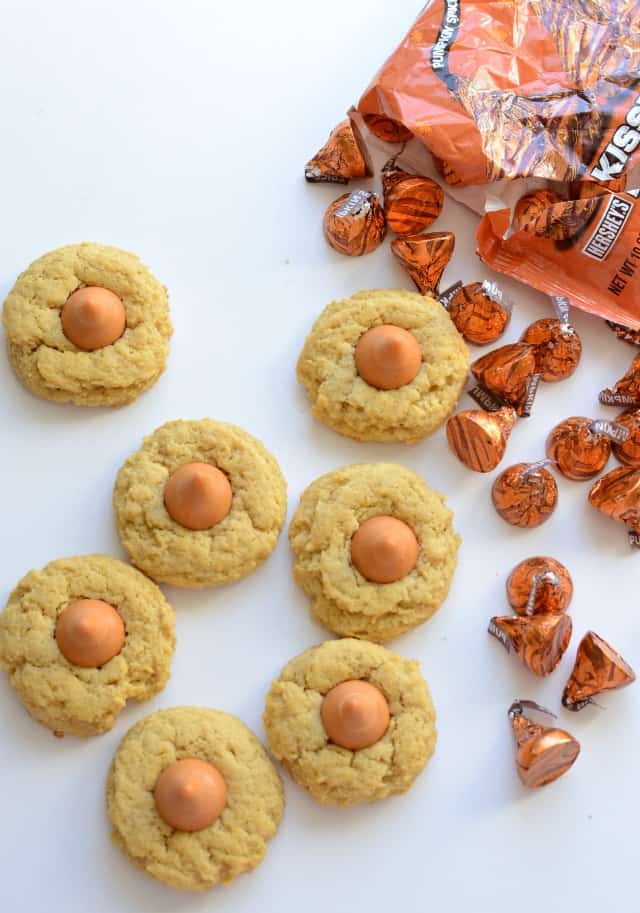 Soft Pumpkin Cookies with Pumpkin Spice Kisses are a twist on the classic peanut butter blossom.